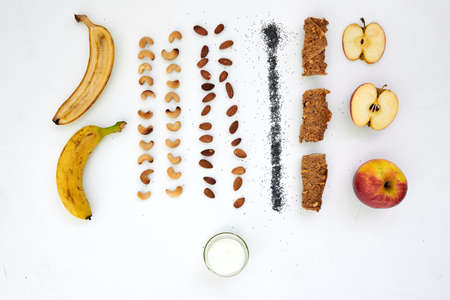Composition of ingredients for making fruit chips and pastilles on a white table.の写真素材