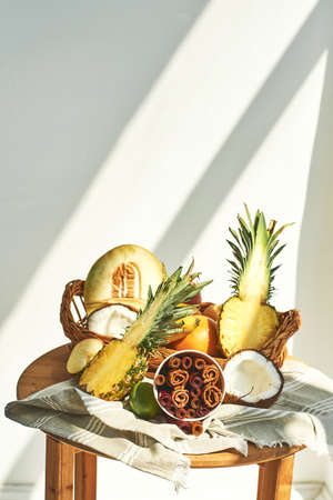 An assortment of different exotic fruits and pastilles on the table.の写真素材
