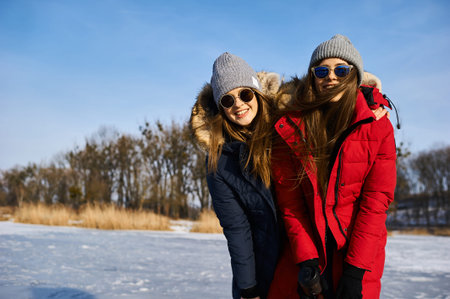 A trendy young girls walk and have a fun outdoor in winter