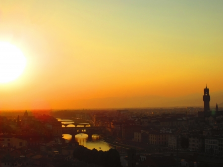 Sunset in Florence with river Arno and Ponte Vecchio                               の写真素材