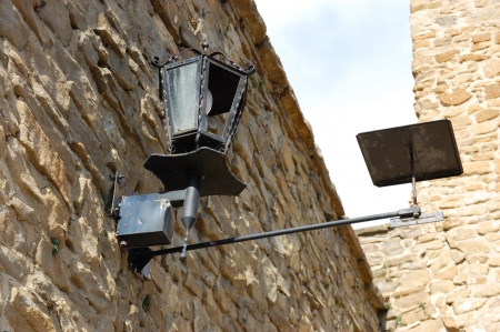 Solar lamp on medieval city wallsの写真素材