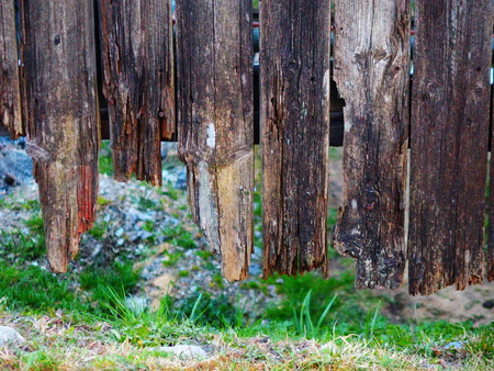 Old desolate wooden  village fenceの写真素材