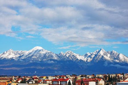 High Tatra Mountains in Winter with view of town Poprad, Slovakia