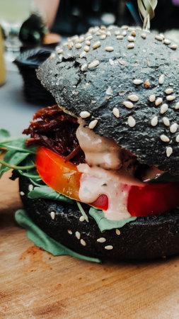 Black hamburger with juicy beefの写真素材