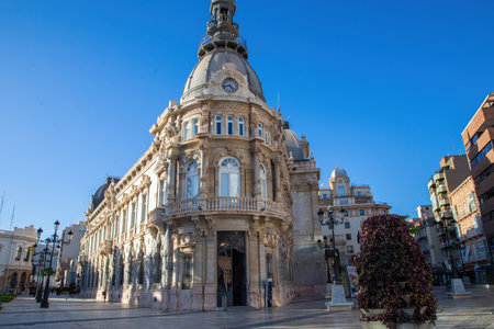 Majestic historic building in spanish plaza with clear blue sky in Cartagena, Spainの写真素材