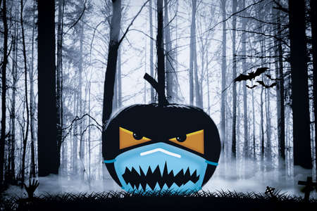 background for halloween with pumpkin with mask with teeth design for protection of virus among spooky forestの写真素材