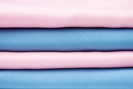 Layer of fabric, pink and blue.