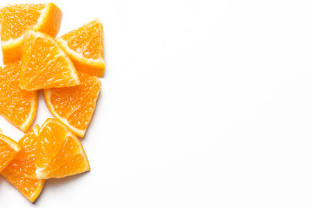 Sliced orange fruit isolated on white background, Copy Space.