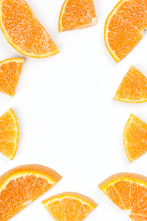 Sliced orange fruit isolated on white backgroundの写真素材