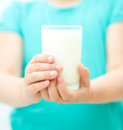 Hands with milk, dairy productの写真素材