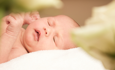 Adorable baby newborn, close-up portraitの写真素材