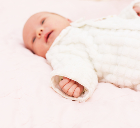 Adorable baby newborn, close-up portraitの写真素材