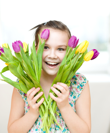 Portrait of the girl with flowers. Spring holiday conceptの写真素材