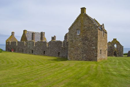 famous remotely set Dunnottar castle in Scotlandの写真素材