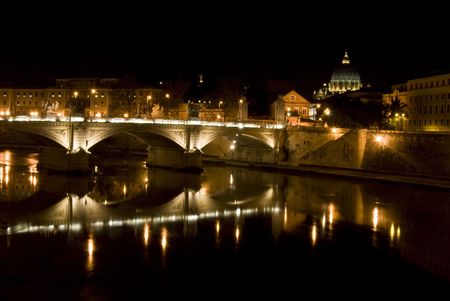 Saint Peter and the Tiber in Rome at nightの写真素材