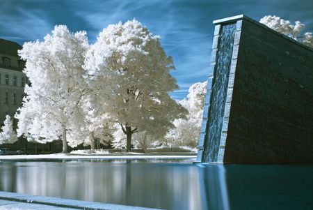 monument for the wall in Berlin changed into a waterfall, photo taken with an infrared filterの写真素材
