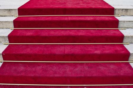 beautiful red carpet leading up old steps の写真素材