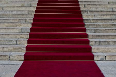 beautiful red carpet leading up old steps の写真素材