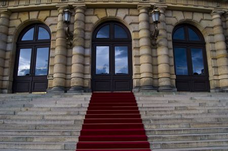 beautiful red carpet leading up old steps の写真素材