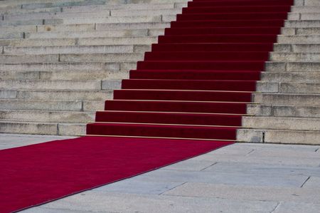 beautiful red carpet leading up old steps の写真素材
