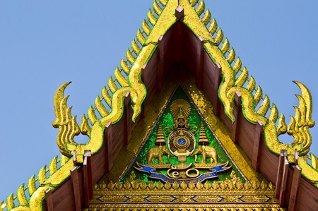 gable with beautiful decoration on a thai templeの写真素材