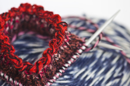 Woolen thread and knitting needle with shallow dof