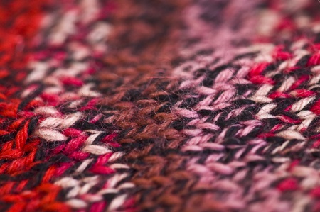 closeup of a knitted piece in colorful stripesの写真素材