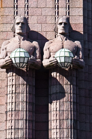 famous art nouveau sculptures at the railway station of Helsinkiの写真素材