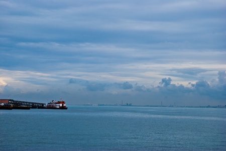 the river Tejo and a ferry at the Cais do Sodre, Lisbonの写真素材