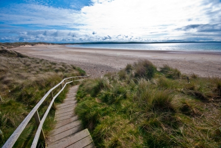 beautiful long beach at the Dunnet Bay in Scotlandの写真素材