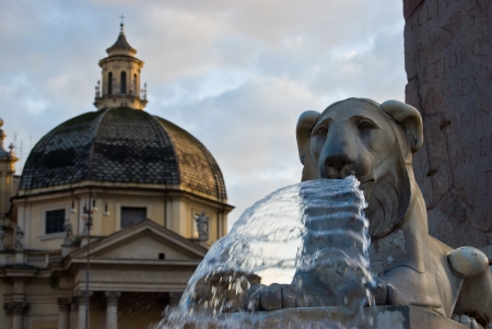 detail of the fountain in the middle of Piazza del Popolo in Romeの写真素材