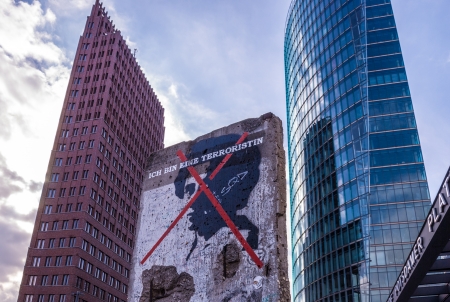 part of the Potsdamer Platz in Berlin with a piece of the Berlin wallのeditorial素材