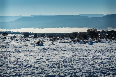 Snow landscape with cloudsの写真素材