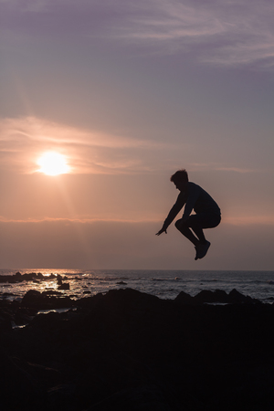 Amazing sunset with silhouette of a model, lifestyleの写真素材