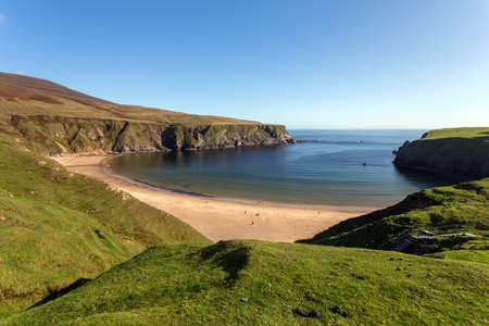 Silver Strand Beach; Co donegal; Ireland, April 2019. An idyllic Donegal beach surrounded by green mountains seen from aboveのeditorial素材