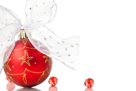 Red Christmas balls with bows on white backgroundの写真素材
