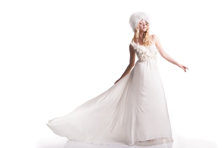 The beautiful young woman posing in a wedding dressの写真素材