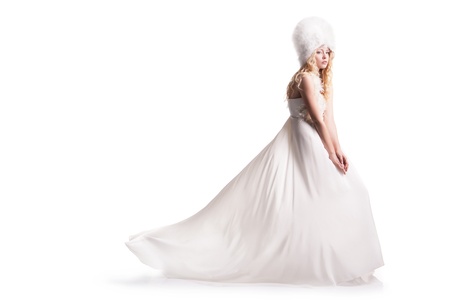 The beautiful young woman posing in a wedding dressの写真素材