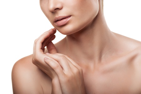 Portrait of half face beautiful woman with hands, on white backgroundの写真素材