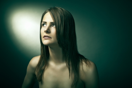 Sensual young woman with beautiful long brown hairの写真素材