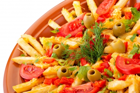golden French fries potatoes with tomato and olive on white backgroundの写真素材