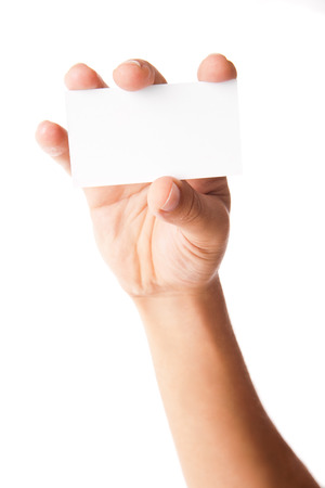 Business card in man's hand on white backgroundの写真素材