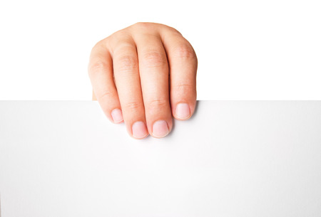Close up of man hand holding blank advertising card on whiteの写真素材