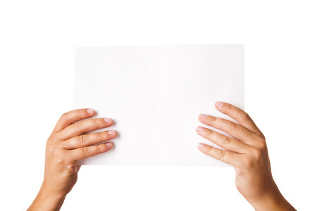 Close up of man hand holding blank advertising card on whiteの写真素材