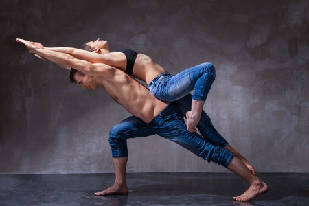 Man and woman in passionate dance poseの写真素材