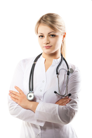 Smiling medical doctor woman with stethoscope. Isolated over white background.の写真素材