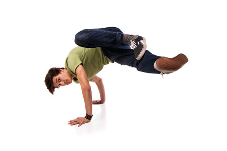 Hip hop dancer man performing isolated over white background