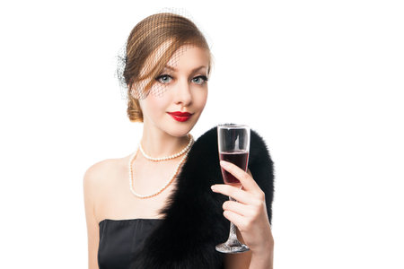 Portrait of beautiful woman with glass red wine  Retro style  Isolated