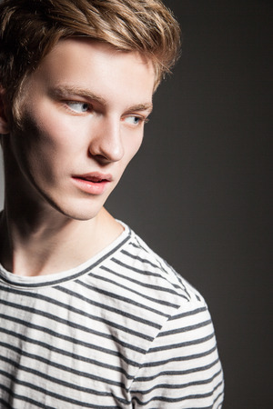 Elegant young handsome man. Studio fashion portraitの写真素材
