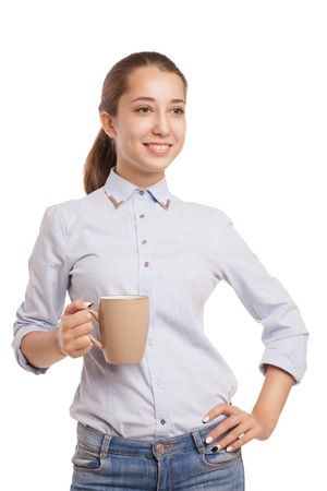 Business woman portrait with cup isolated over white backgroundの写真素材